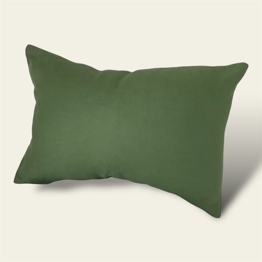 A vibrant green linen cushion cover