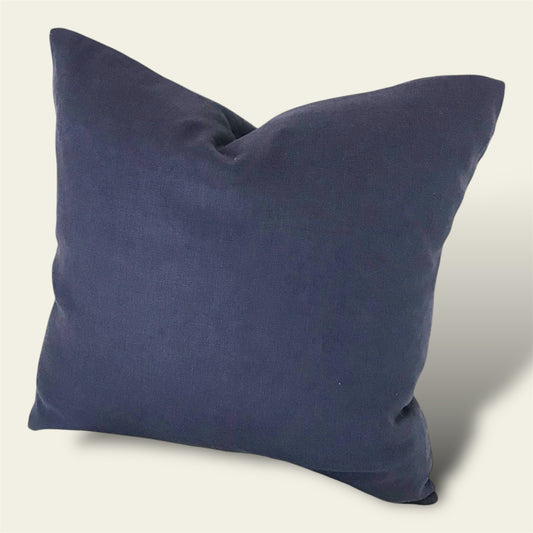 a deep midnight blue linen cushion cover